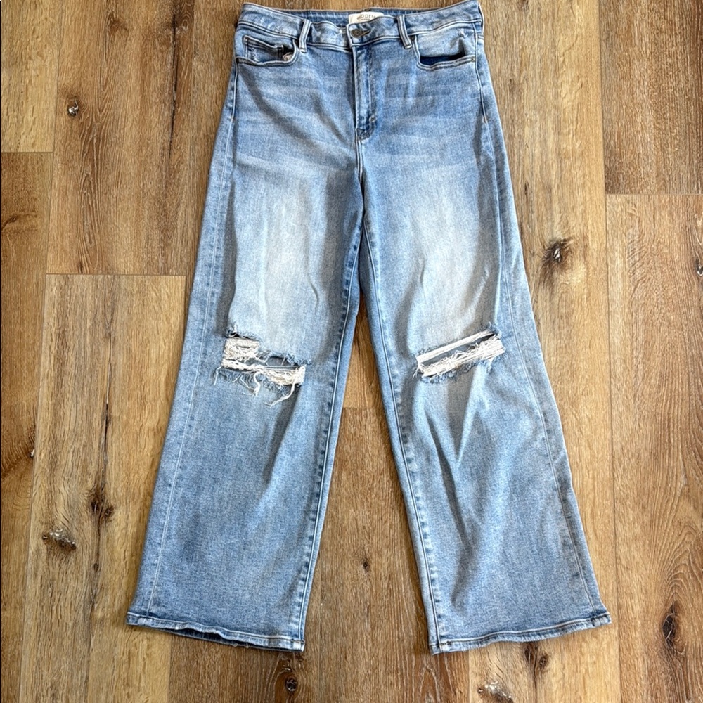 Light Blue Distressed Flare Jeans with Raw Hem
